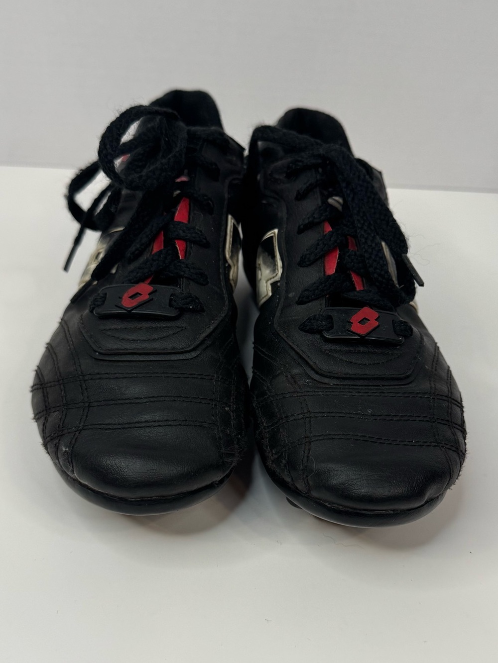 Kids Black Soccer Cleats with Red Details